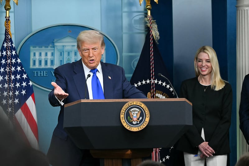 President Donald Trump speaks alongside Attorney General Pam Bondi as they celebrate the Supreme Court decision on June 27, 2025.