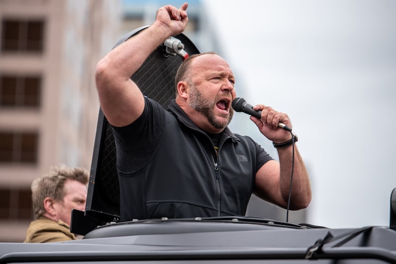 Alex Jones insists that Trump isn't running a cult, while simultaneously saying that he doesn't want any part of it.