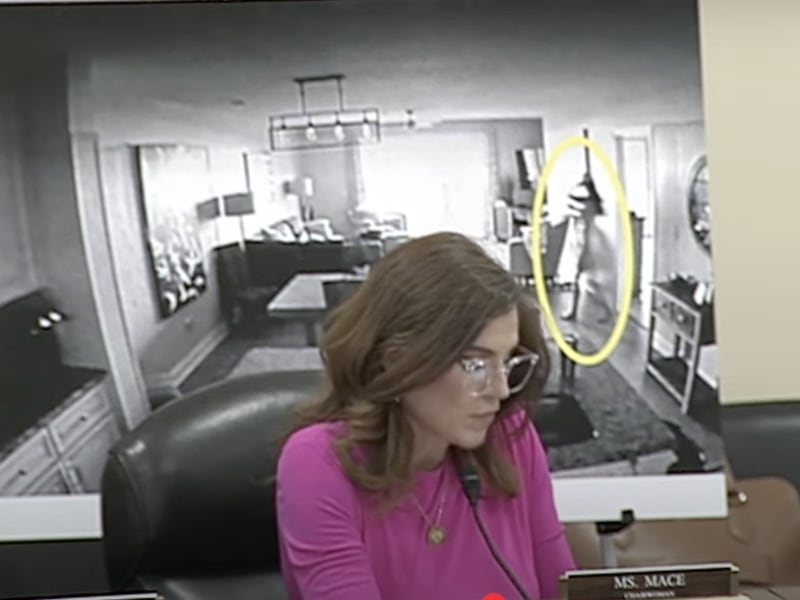 Congresswoman Nancy Mace speaking at a hearing on Capitol Hill on May 20 with a poster showing her silhouette circled as she accused her ex of filming her naked without consent.