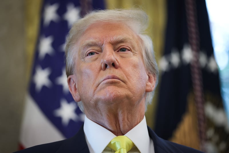 WASHINGTON, DC - AUGUST 07: U.S. President Donald Trump listens to questions from reporters after speaking on economic data in the Oval Office on August 07, 2025 in Washington, DC. Trump fired Bureau of Labor Statistics Commissioner Dr. Erika McEntarfer on August 1st, claiming the agency issued “phony” jobs numbers during the Biden administration to aid Democrats. (Photo by Win McNamee/Getty Images)