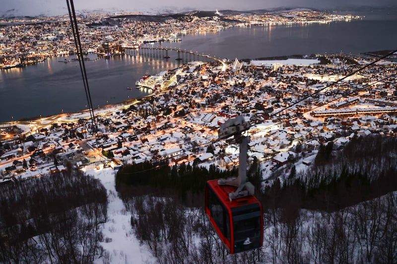 A view of the city and Fjellheisen cable car in Tromso, Norway, where Mads Mikkelsen is from. North of the Arctic Circle, it is a popular destination for northern lights and midnight sun tourism.