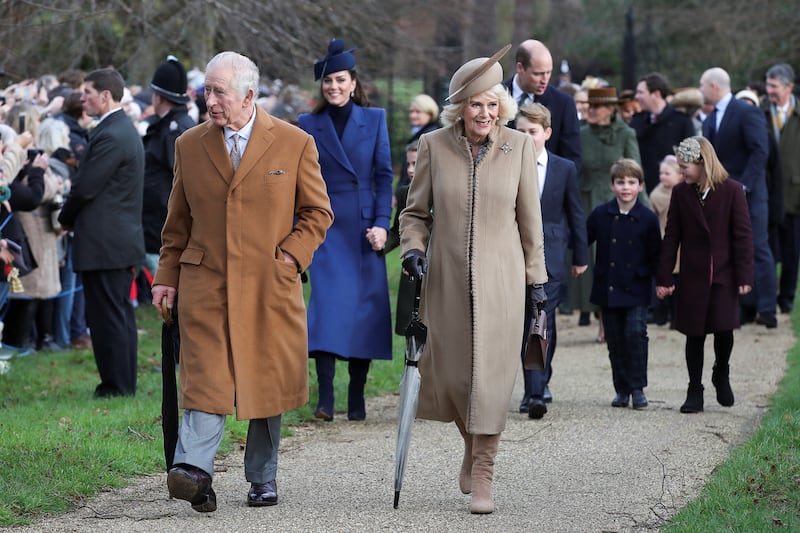 King Charles, Queen Camilla, Prince William, Kate Middleton, Prince George, Princess Charlotte, Prince Louis and Mia Tindall arrive to attend the Christmas Day service at St. Mary Magdalene's church, Sandringham, Dec. 25, 2023.