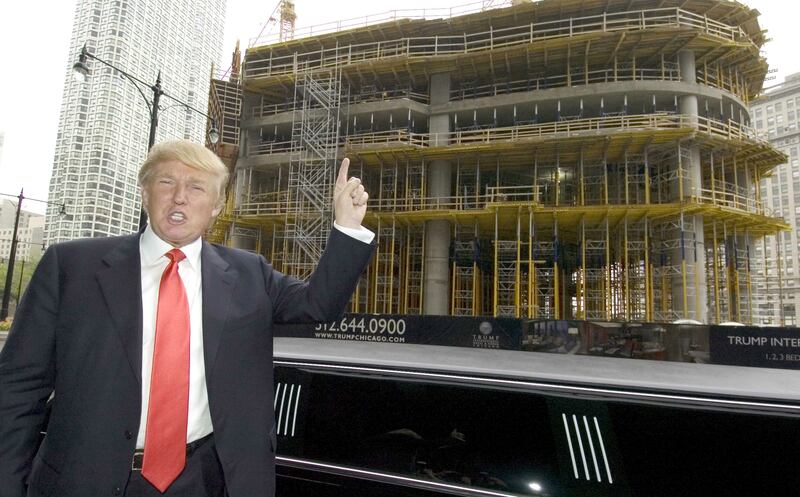 Donald Trump poses across the street from the job site of the Trump International Hotel and Tower Chicago after a news conference in Chicago May 10, 2006.