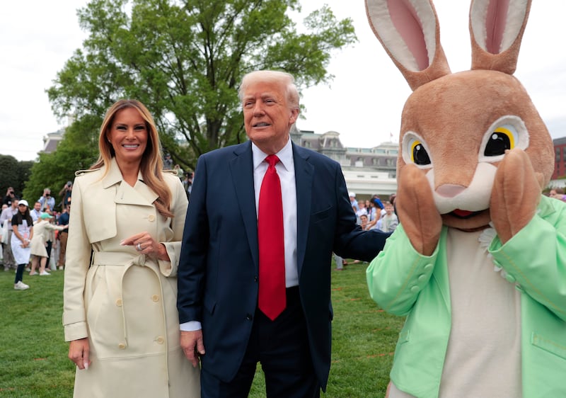 WASHINGTON, DC - APRIL 21: U.S. President Donald Trump, first lady Melania Trump and the Easter Bunny greet guests durning the White House Egg Roll on the South Lawn of the White House on April 21, 2025 in Washington, DC. The White House is expecting thousands of children and adults to participate in the annual tradition of rolling colored eggs down the White House lawn, which was started by President Rutherford B. Hayes in 1878. (Photo by Anna Moneymaker/Getty Images)