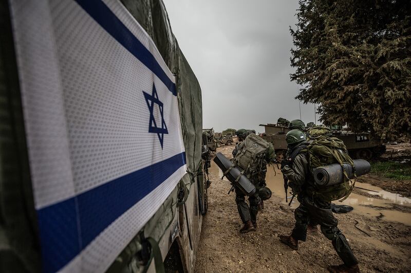 Israeli soldiers and armored vehicles on the Gaza border, in Nahal Oz, Israel.