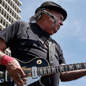 Neil Young and Joan Baez perform during the ‘Fighting Oligarchy’ tour at Grand Park in 2025.