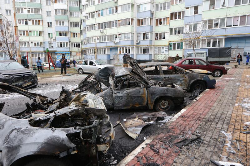 Burned-out cars are seen in a residential area of the city of Belgorod following fresh aerial attacks on March 22, 2024.