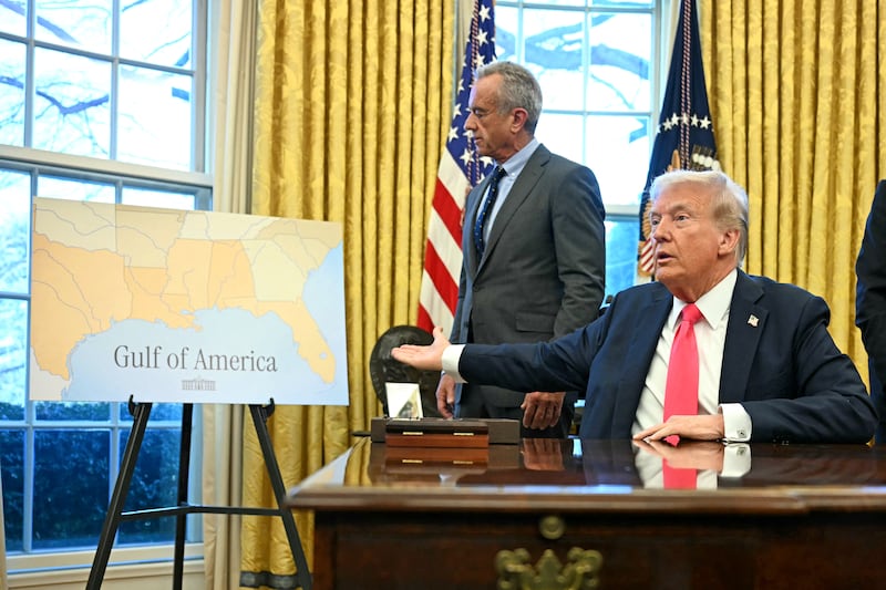 President Donald Trump points to a map reading "Gulf of America" as he speaks to the press after signing an Executive Order at the Oval Office on Feb. 25, 2025.