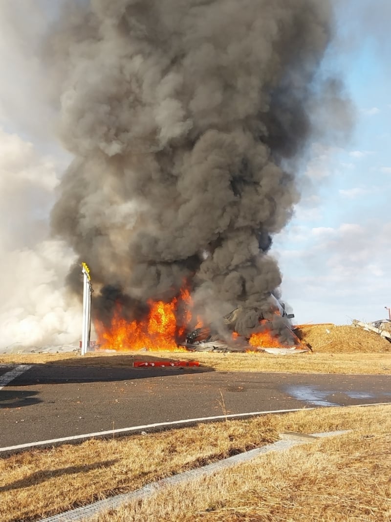 Flaming wreckage of Jeju Air jet