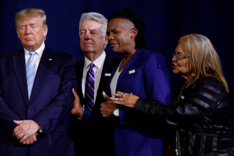 Michael Tait (second from right) prays over President Donald Trump with other faith leaders during a "Evangelicals for Trump" campaign in 2020.