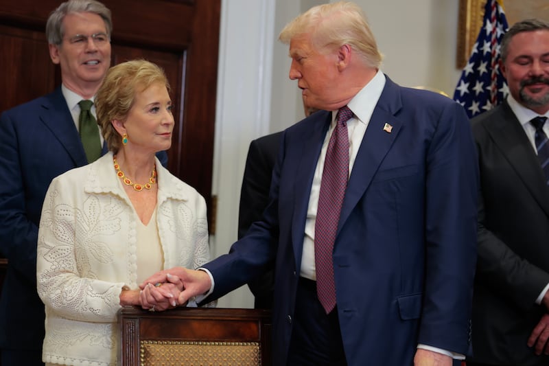 WASHINGTON, DC - JULY 31: U.S. President Donald Trump speaks with Secretary of Education Linda McMahon during an executive order signing ceremony in the Roosevelt Room of the White House on July 31, 2025 in Washington, DC. Trump signed a series of orders that will expand on his council on sports, fitness and nutrition, including by reviving the Presidential Fitness Test in public schools. (Photo by Anna Moneymaker/Getty Images)