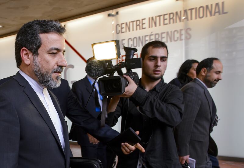 articles/2013/10/15/western-and-iranian-diplomats-upbeat-after-swiss-talks-on-security-issues/OZ_Iran_Aragchci_vf37xl