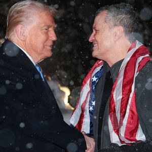 As snow falls, U.S. President Donald Trump welcomes Marc Fogel back to the United Stated after Fogel was released from Russian custody, at the White House on February 11, 2025 in Washington, DC.