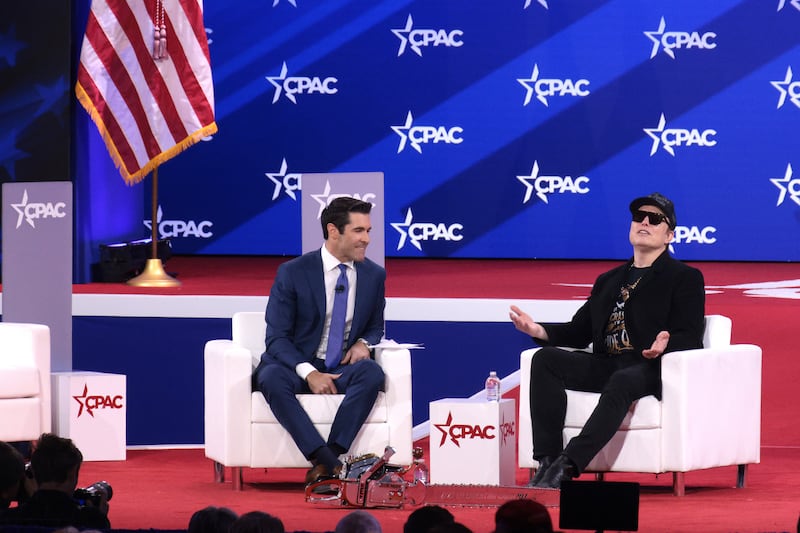 CEO of Tesla and SpaceX Elon Musk participates in an interview with Newsmax anchor Rob Schmitt at the Conservative Political Action Conference (CPAC) at the Gaylord National Resort Hotel And Convention Center on February 20, 2025 in Oxon Hill, Maryland.