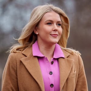 White House press secretary Karoline Leavitt walks towards the West Wing after a television interview on March 14, 2025 in Washington, DC.
