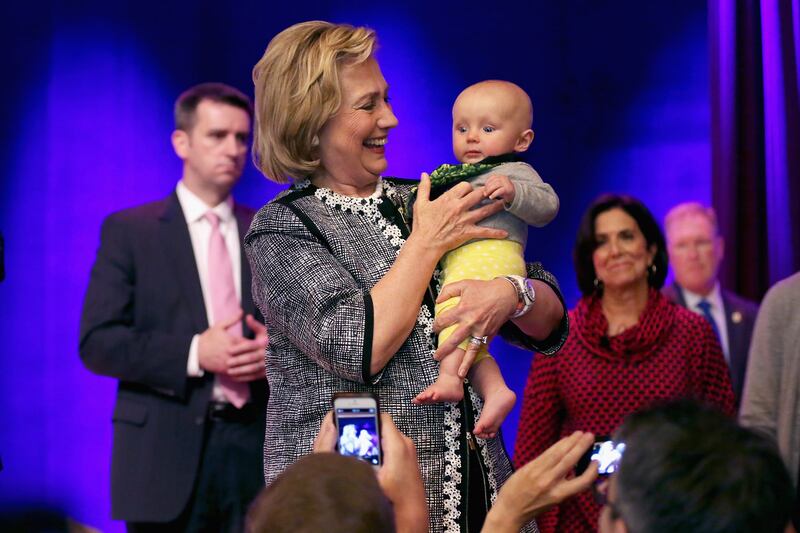 articles/2014/07/03/hillary-clinton-s-golden-ticket-paid-family-medical-leave/140702-tomasky-hillary-tease_th4yc2