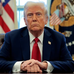 U.S. President Donald Trump talks to reporters.