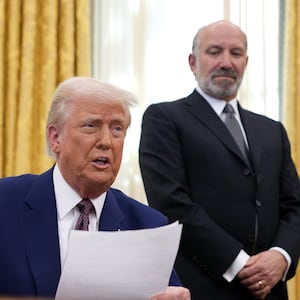 President Donald Trump, joined by Secretary of Commerce Howard Lutnick, delivers remarks on reciprocal tariffs in the Oval Office at the White House on February 13, 2025 in Washington, DC. Trump announced his plan to increase U.S. tariffs to match the rates other nations charge to import American goods.