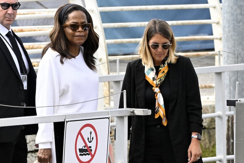 Oprah Winfrey preparing to board a water taxi at Venice’s Marco Polo Airport.