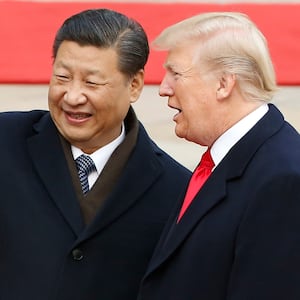 Chinese President Xi Jinping and U.S. President Donald Trump attend a welcoming ceremony November 9, 2017 in Beijing, China. Trump is on a 10-day trip to Asia.