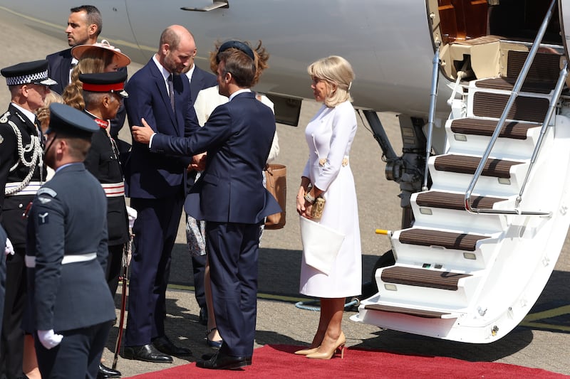 NORTHOLT, ENGLAND - JULY 8: France's President Emmanuel Macron and his wife Brigitte Macron are greeted by Prince William, Prince of Wales and Catherine, Princess of Wales upon arrival at RAF Northolt on July 8, 2025 in London, England. President Emmanuel Macron and Mrs Brigitte Macron visit the UK in the first visit State Visit made by France in 17 years. They are staying at Windsor Castle, hosted by King Charles III and Queen Camilla, and a banquet will be held there in their honour. The Macrons will visit Imperial College, and the President will address Parliament during his stay.  (Photo by Geoff Pugh - WPA Pool/Getty Images)