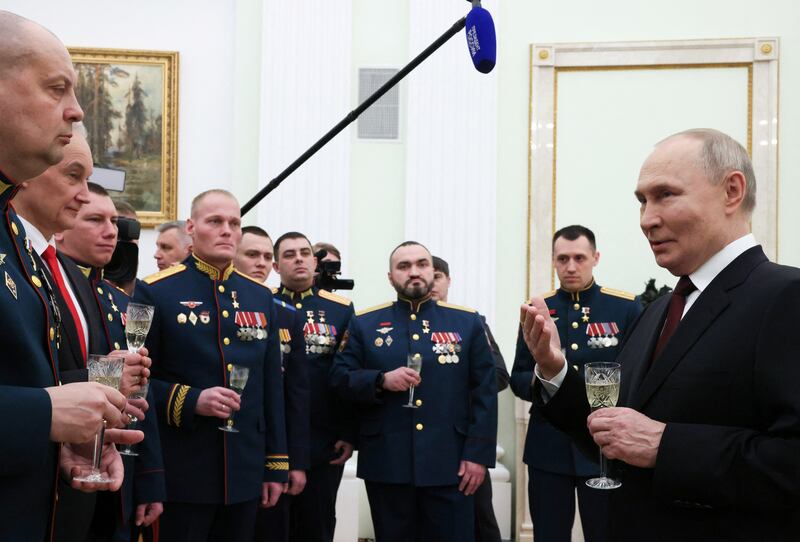 Russian President Vladimir Putin meets with recipients of Gold Star medal of Hero of Russia following a ceremony to present state decorations to personnel of Russia's Defence Ministry and National Guard troops on the Defender of the Fatherland Day at the Kremlin in Moscow, Russia February 23, 2025. Sputnik/Mikhail Metzel/Pool via REUTERS ATTENTION EDITORS - THIS IMAGE WAS PROVIDED BY A THIRD PARTY.