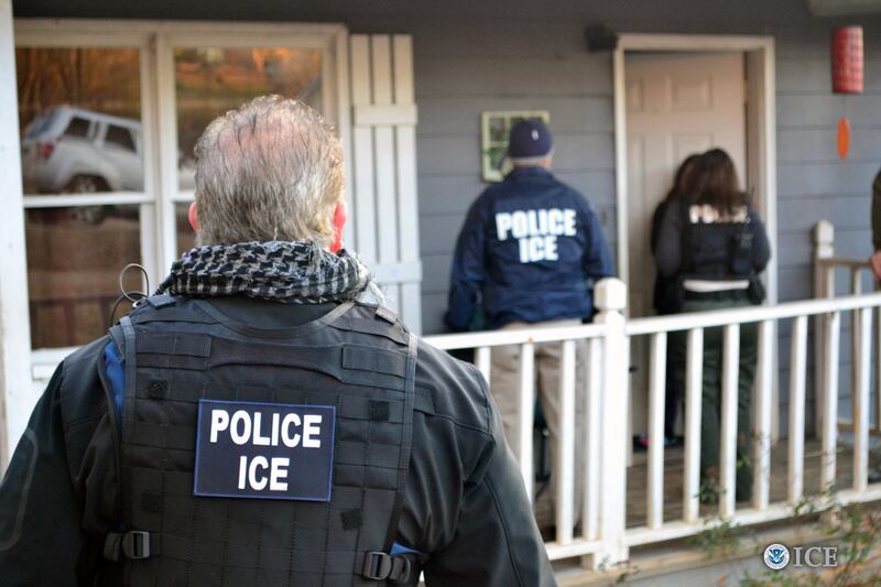 ICE at someone's home in 2017 in Atlanta, Georgia.