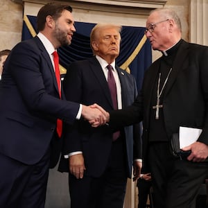 Vice President J.D. Vance and President Donald Trump greet Cardinal Timothy M. Dolan after he delivered the invocation during inauguration ceremonies in the Rotunda of the U.S. Capitol on January 20, 2025 in Washington, DC.