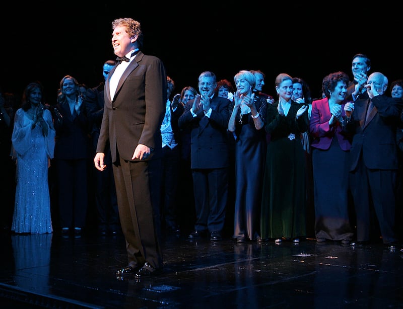Michael Crawford, the original actor to play the phantom, takes a bow during the curtain call of "The Phantom of the Opera" in New York on January 9, 2006, as the production captured the title of longest-running show in Broadway history.