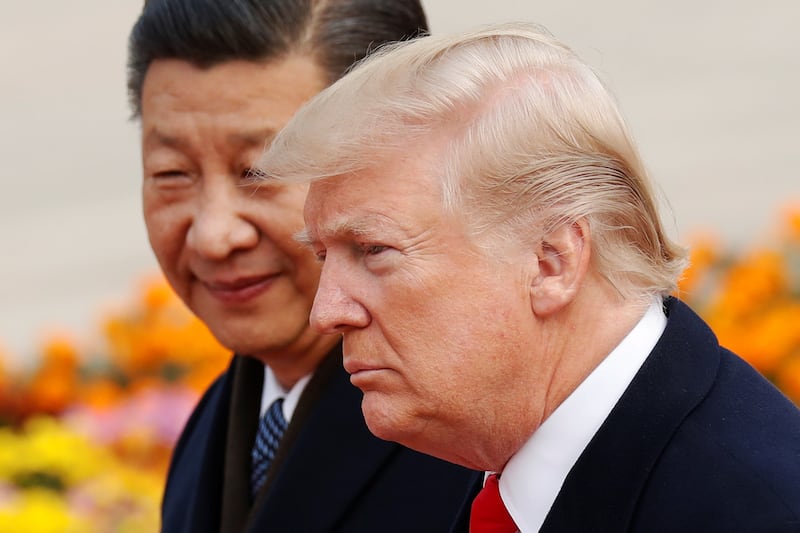 U.S. President Donald Trump takes part in a welcoming ceremony with China's President Xi Jinping in Beijing, China, November 9, 2017. REUTERS/Damir Sagolj