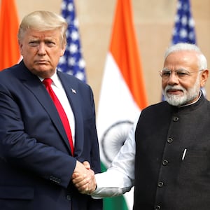 U.S. President Donald Trump shakes hands with Indian Prime Minister Narendra Modi at Hyderabad House in New Delhi, India, February 25, 2020.