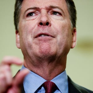 Former FBI Director James Comey speaks to the media after giving a private deposition to the House Judiciary and House Government and Oversight committees on Capitol Hill in Washington, U.S., December 7, 2018.