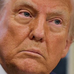 U.S. President Donald Trump looks on, on the day he signs an executive order in the Oval Office at the White House in Washington, U.S., January 31, 2025.