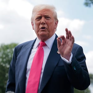 U.S. President Donald Trump speaks to the media as he departs the White House before traveling to Pittsburgh, Pennsylvania.