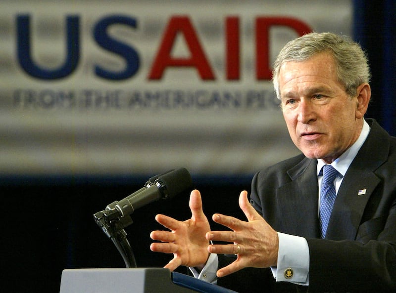 US President George W. Bush addresses USAID employees and non-government organzation (NGO) presidents 10 January 2005 inside the Ronald Reagan Building and International Trade Center in Washington, DC.  Bush underlined Washington's full commitment to help rehabilitate and rebuild Asia's tsunami-afflicted economies.  AFP Photo/Paul J. Richards (Photo by Paul J. RICHARDS / AFP) (Photo by PAUL J. RICHARDS/AFP via Getty Images)