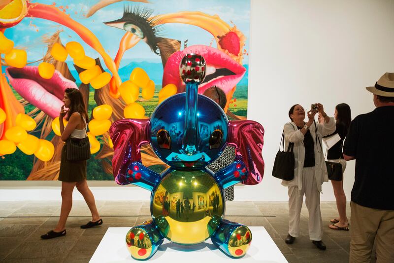 articles/2014/06/26/jeff-koons-s-bright-shiny-objects/140625-jjones-koons-tease_zc7mjh