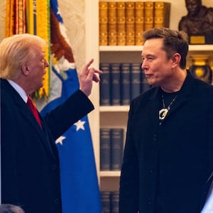 US President Donald Trump and Elon Musk (R).