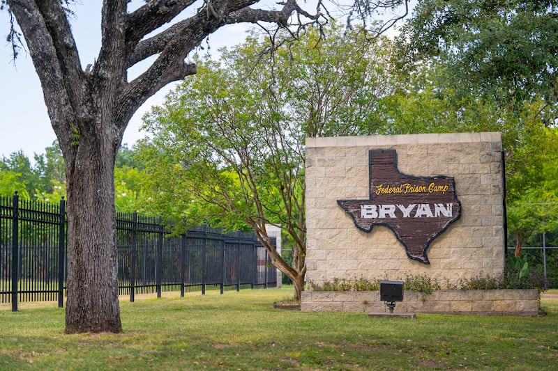 Signage is displayed near the entrance to Federal Prison Camp Bryan on Friday.