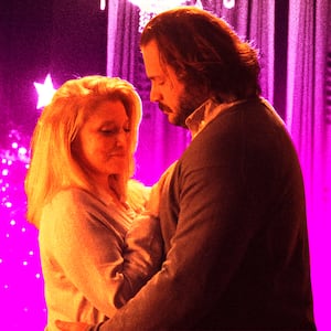A photo illustration of Liz Larsen and Michael Strassner in The Baltimorons.