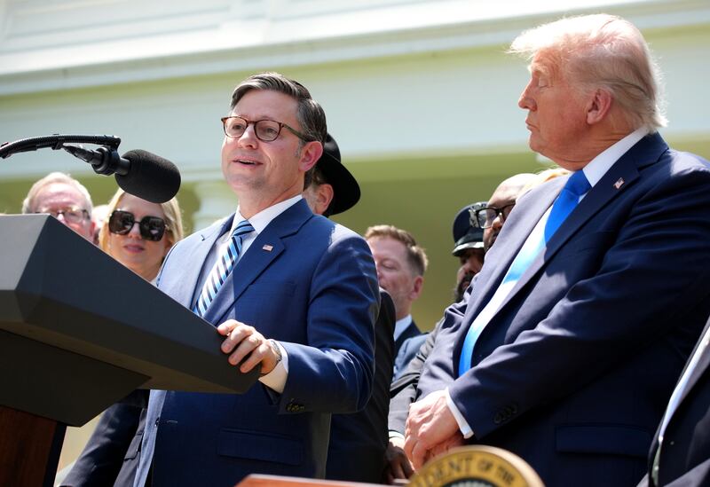House Speaker Mike Johnson with President Trump at a White House event on Thursday, May 1, as Republicans' "big, beautiful" bill faces hurdles over Medicaid cuts.