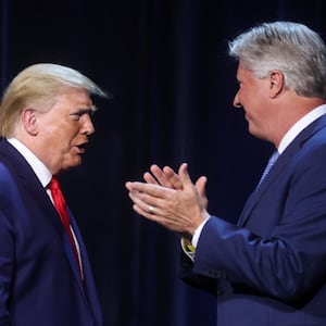 U.S. President Donald Trump is greeted by Pastor Robert Morris