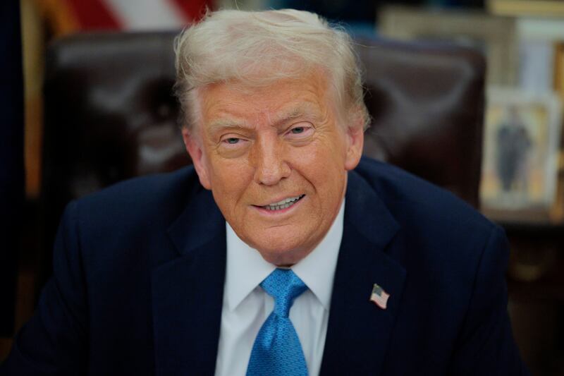 Trump talks to reporters after signing an executive order, "Unleashing prosperity through deregulation," in the Oval Office on January 31, 2025 in Washington, DC. Trump spoke to reporters about tariffs against China, Canada and Mexico and how the newly confirmed Interior Secretary Doug Burghum will coordinate with the Energy Department and the Environmental Protection Agency. (Photo by Chip Somodevilla/Getty Images)