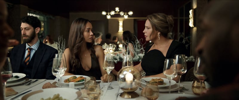 Zoe Saldaña as Rita Moro Castro and Karla Sofía Gascón as Emilia Pérez