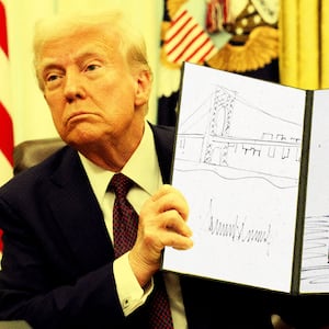 Donald Trump holding up drawings he did allegedly of buildings