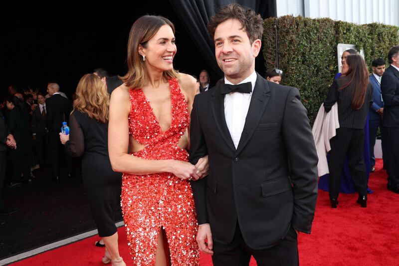 Mandy Moore (L) and husband Taylor Goldsmith.