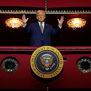 U.S. President Donald Trump looks down from the Presidential Box in the Opera House at the John F. Kennedy Center for the Performing Arts as he participates in a guided tour and leads a board meeting on March 17, 2025 in Washington, DC.