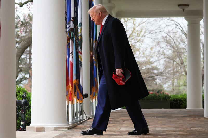 U.S. President Donald Trump walks to deliver remarks on tariffs, in the Rose Garden at the White House in Washington, D.C., U.S., April 2, 2025. REUTERS/Leah Millis