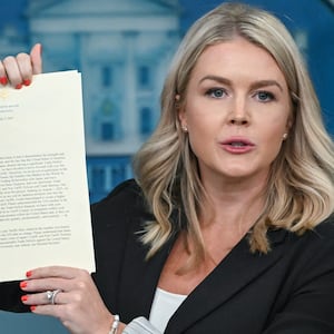 White House Press Secretary Karoline Leavitt holds a letter from President Donald Trump addressed to Japanese Prime Minister Shigeru Ishiba as she speaks during the daily briefing in the Brady Briefing Room of the White House in Washington, DC, on July 7, 2025.