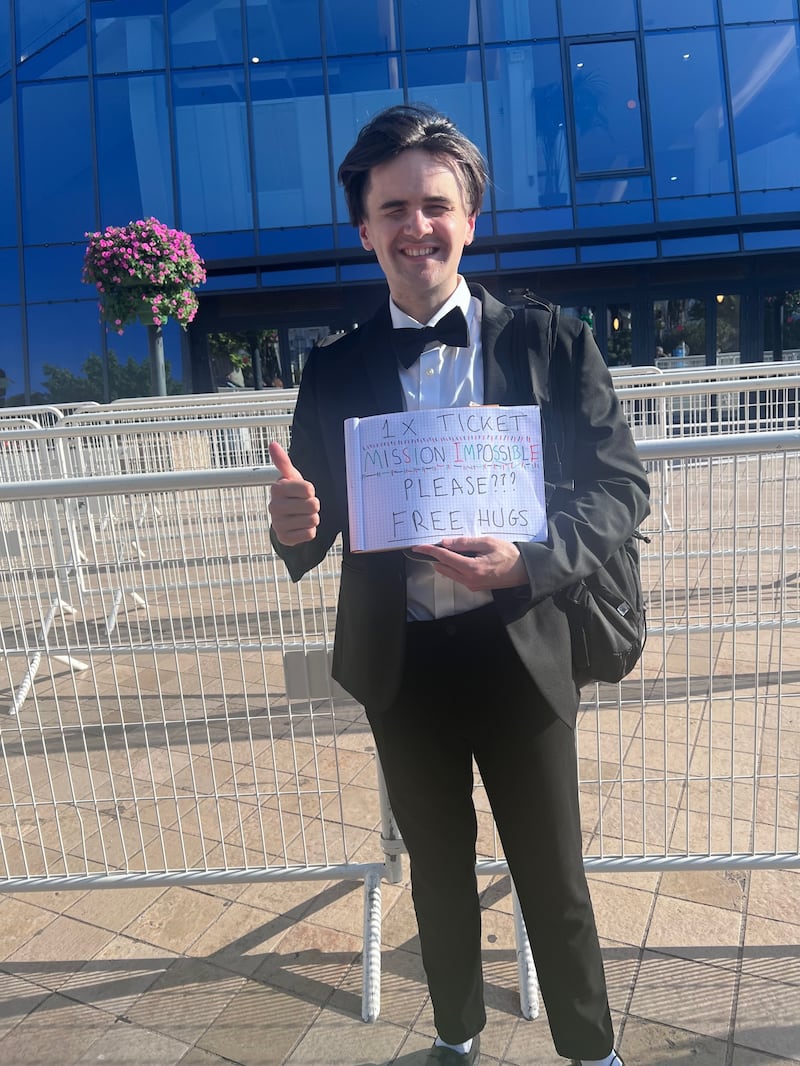 A fan outside the "Mission: Impossible - The Last Reckoning' Cannes premiere