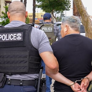 ICE agents make an arrest in Los Angeles